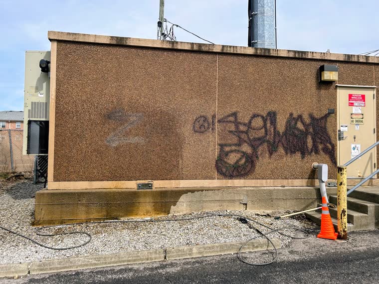 Graffiti removal cleaning in progress